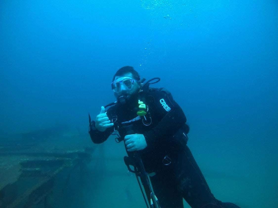 Scuba divers preparing on charter boat